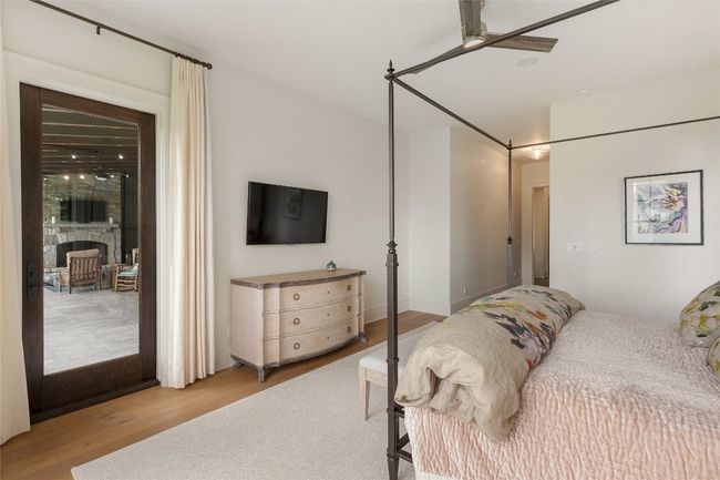 Primary suite walkout to deck | Image 44