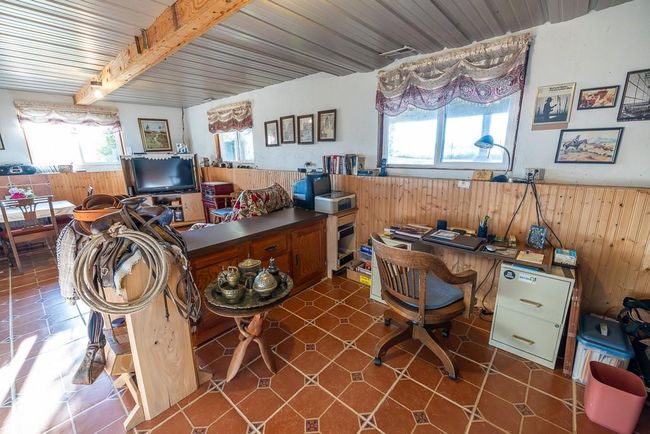 Home office with wooden walls and beamed ceiling | Image 24