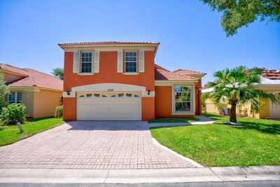 5339 Edenwood Lane, House other with 4 bedrooms, 2 bathrooms and null parking in Riviera Beach FL | Image 2