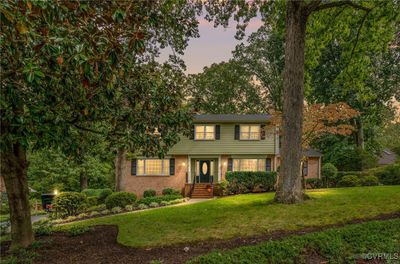 Colonial house with a lawn | Image 1