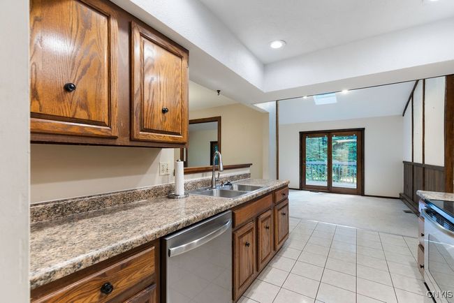 Kitchen features stainless steel appliances! | Image 12