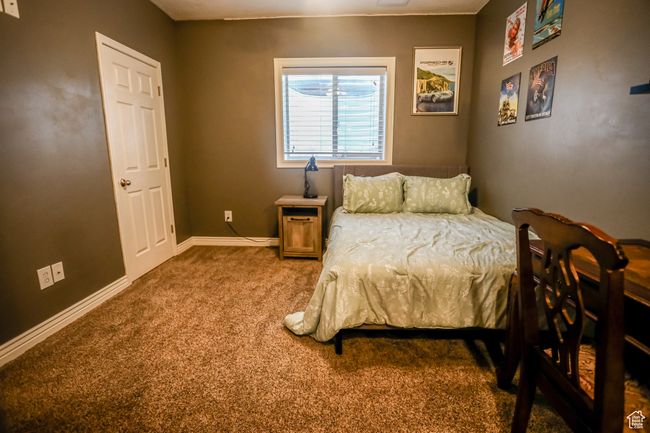 Bedroom featuring carpet and baseboards | Image 29