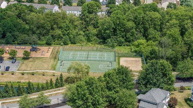 Perfectly situated within the neighborhood to take advantage of the pool, private clubhouse, sports, basketball and tennis courts, plus playgrounds. | Image 33