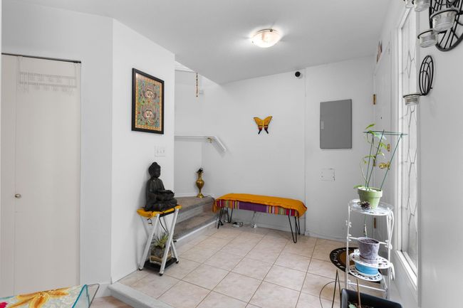 Interior space with electric panel and light tile patterned flooring | Image 14