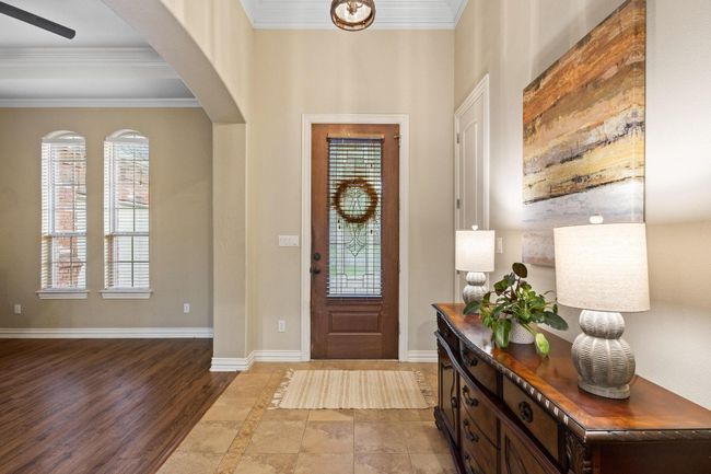 Stunning front door, spacious closet. | Image 8