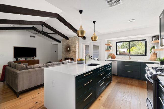 Soft close cabinets and black stainless appliances | Image 14