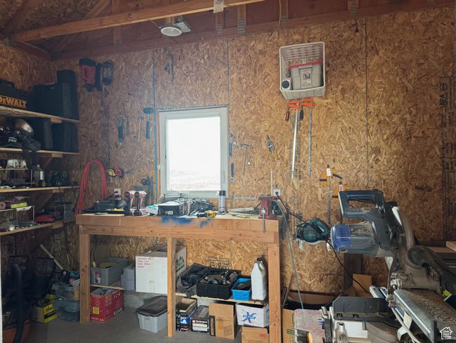 Miscellaneous room featuring a workshop area | Image 25
