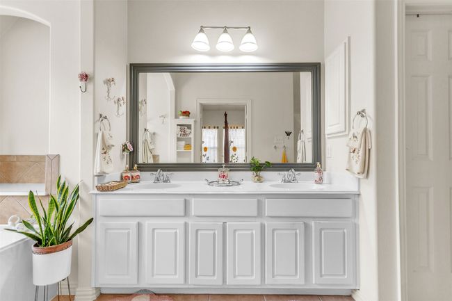 Bathroom featuring double vanity | Image 24
