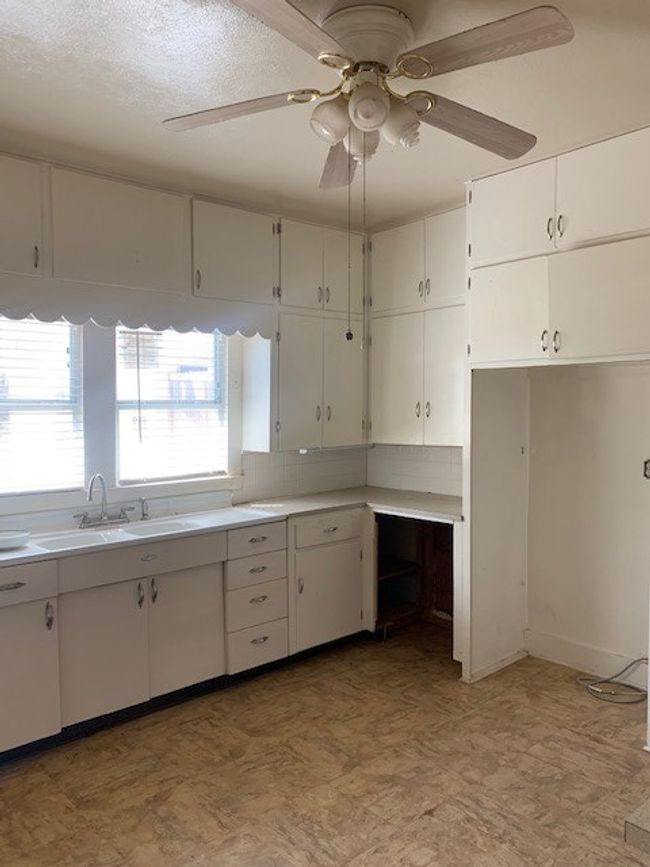 Kitchen with lots of cabinets | Image 11