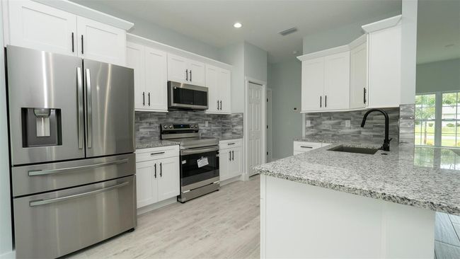 12323 Genter Dr, House other with 4 bedrooms, 2 bathrooms and null parking in Spring Hill FL | Image 9