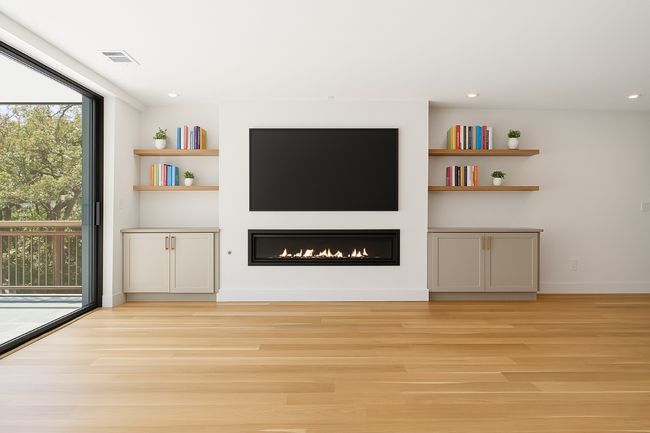 Virtuallt staged TV and floating shelves, fireplace and cabinets are there | Image 5