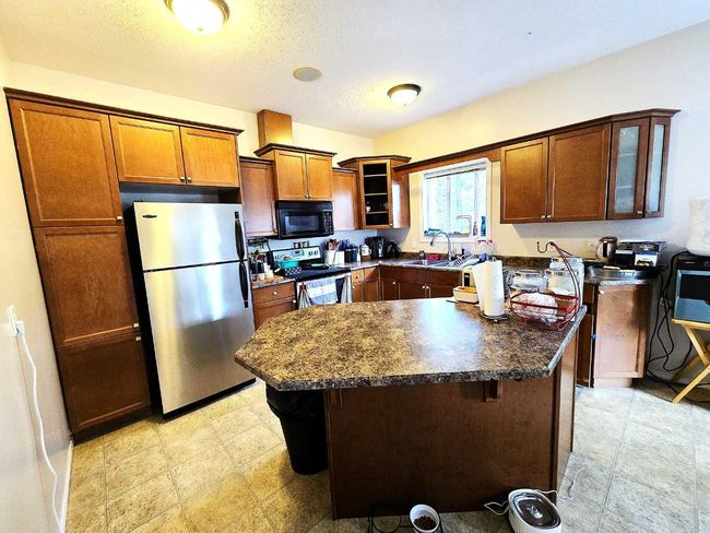 108 Moberly Road, Home with 4 bedrooms, 4 bathrooms and 3 parking in Grande Cache AB | Image 5