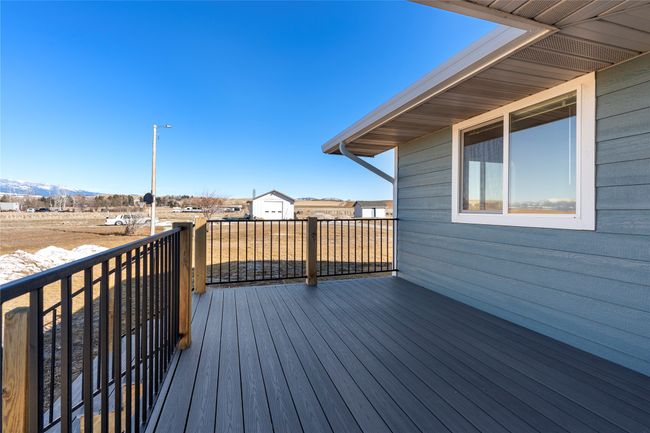 Expansive deck space, perfect for gatherings or quiet mornings | Image 27