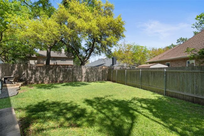 View of yard with a fenced backyard | Image 39