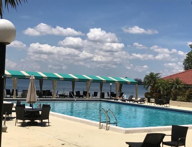 MAIN POOL WITH SHADE | Image 12