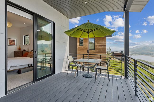 Deck featuring a water and mountain view | Image 48