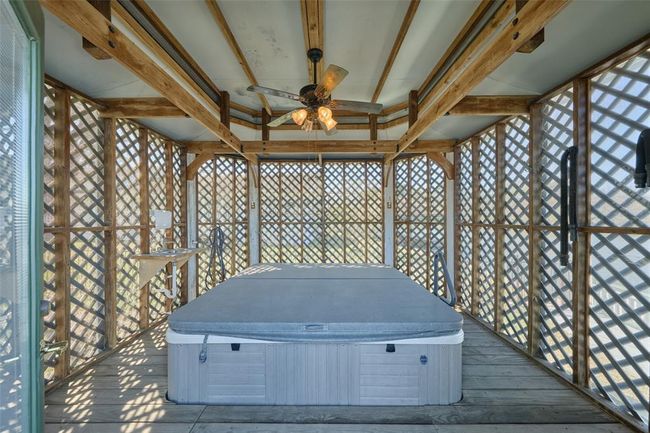 Enjoy the enclosed Hot Tub | Image 36