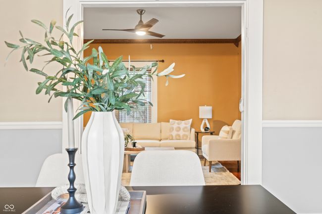 dining room featuring crown molding and ceiling fan | Image 15