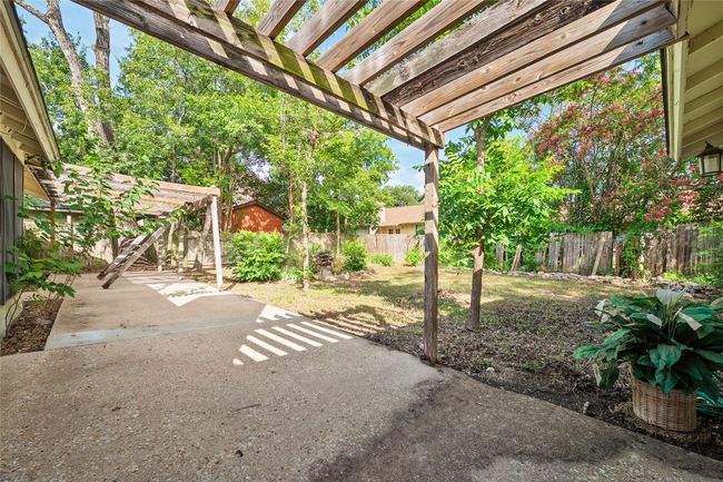 Fenced backyard featuring a patio area and a pergola | Image 13
