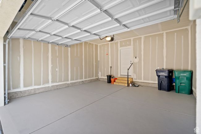 Garage featuring a garage door opener | Image 40