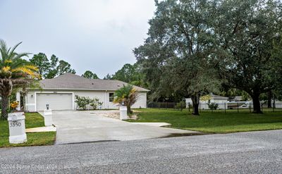 3550 Sparrow Hawk Trail, House other with 4 bedrooms, 2 bathrooms and null parking in Mims FL | Image 3