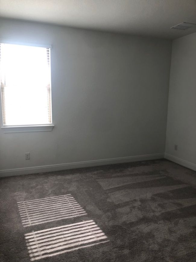 Unfurnished room with plenty of natural light and carpet floors | Image 23