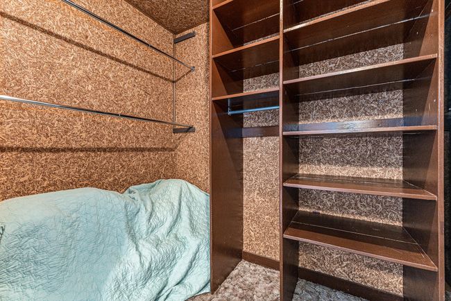 Walk in closet in primary bedroom | Image 18
