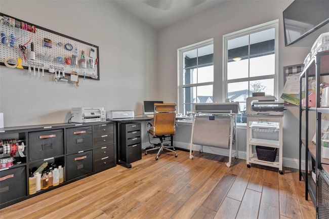 Bedroom 2, currently used as a work room | Image 17