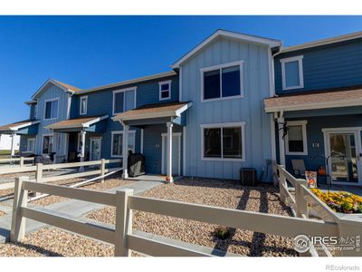 Fenced in front patio area is easily maintained and pet friendly. | Image 3