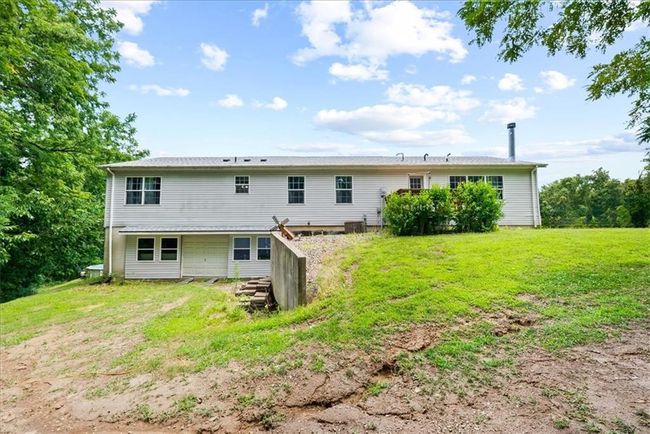 Back of house with a yard | Image 29