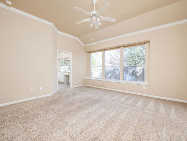 The main bedroom is private; the doorway shown leads to a large en suite | Image 11