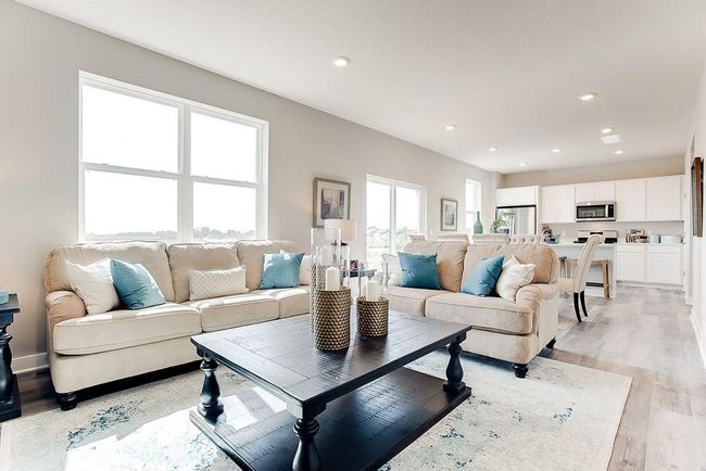 Another view of the living room. Photo of model home, color & options will vary. | Image 9