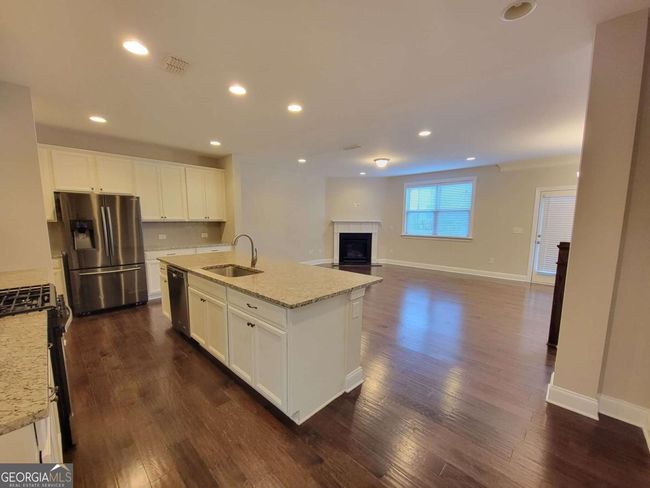 8265 Village Pl, Townhouse with 3 bedrooms, 3 bathrooms and 2 parking in Suwanee GA | Image 4