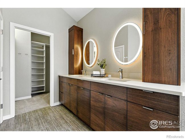 A double-sink vanity has lots of storage. | Image 14