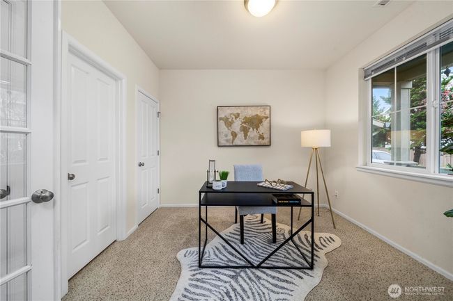 Main floor bdrm or office with dual closets | Image 17
