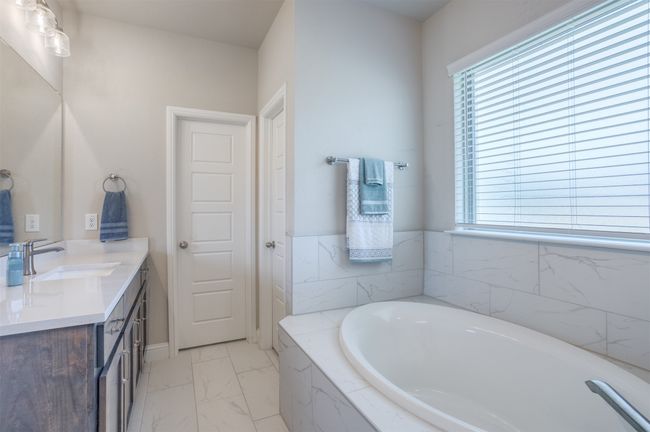 Separate Vanities, soaking tub and more. | Image 18