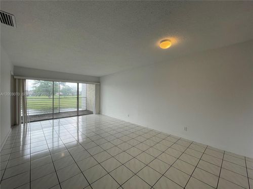 204-7410 Woodmont Ter, Tamarac, FL, 33321-2540 | Card Image