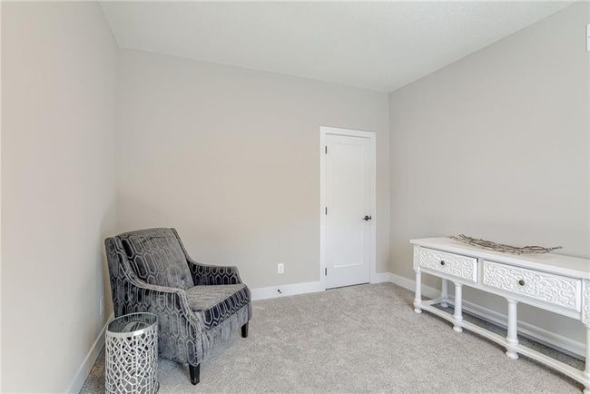 Living area featuring carpet and baseboards | Image 21