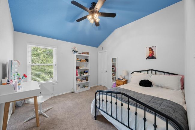 Secondary bedroom featuring walk in closet | Image 30