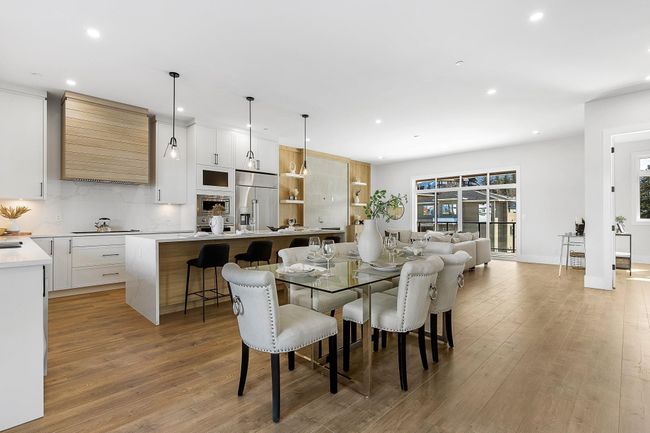 Dining area with recessed lighting, light wood-type flooring, and baseboards | Image 13