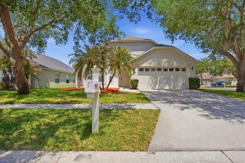 1353 Crimson Clover Ln, WESLEY CHAPEL, FL, 33543-6576 | Card Image