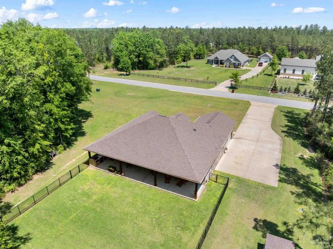 9241 Sage Forest Ln, House other with 3 bedrooms, 3 bathrooms and 2 parking in Pace FL | Image 52
