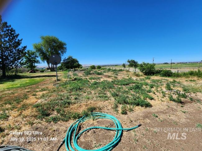 View of yard featuring a view of countryside | Image 11
