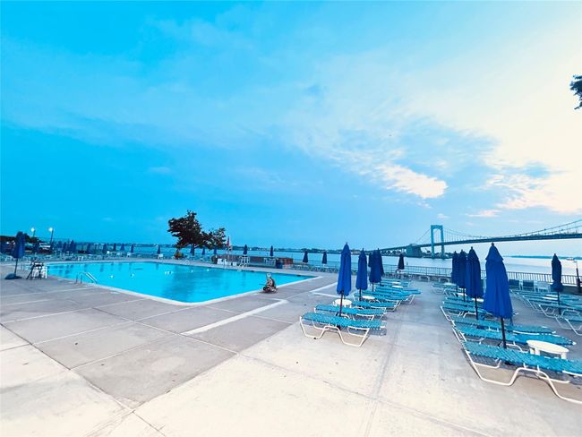 Community pool featuring a patio area | Image 11