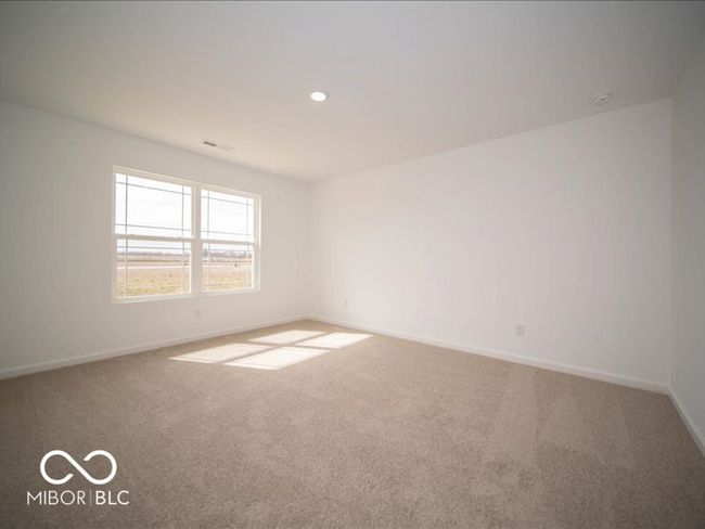 carpeted spare room featuring recessed lighting, visible vents, and baseboards | Image 25