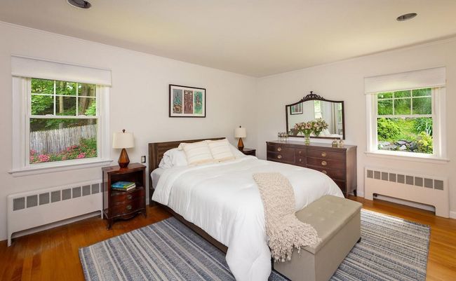 Primary bedroom with matching double closets | Image 12