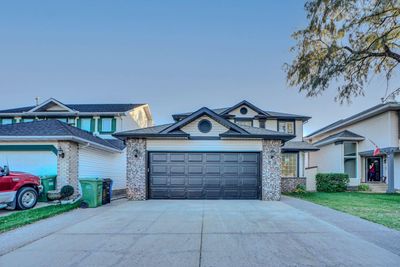 59 Douglas Shore Close Se, House other with 4 bedrooms, 3 bathrooms and 4 parking in Calgary AB | Image 2