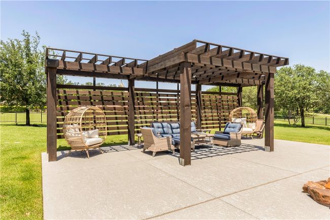 View of patio featuring an outdoor living space and a pergola | Image 12