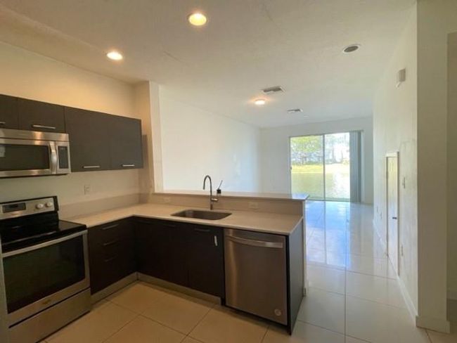 3515 Nw 13 Th St, Townhouse with 3 bedrooms, 3 bathrooms and null parking in Lauderhill FL | Image 6