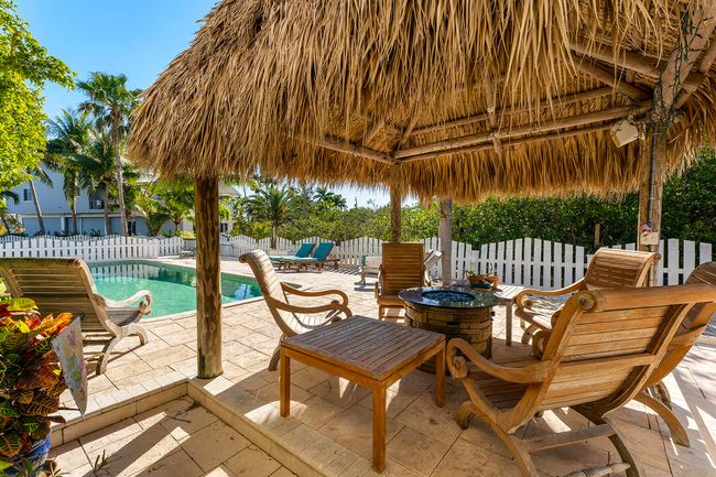 Dine, relax, read by the pool | Image 49